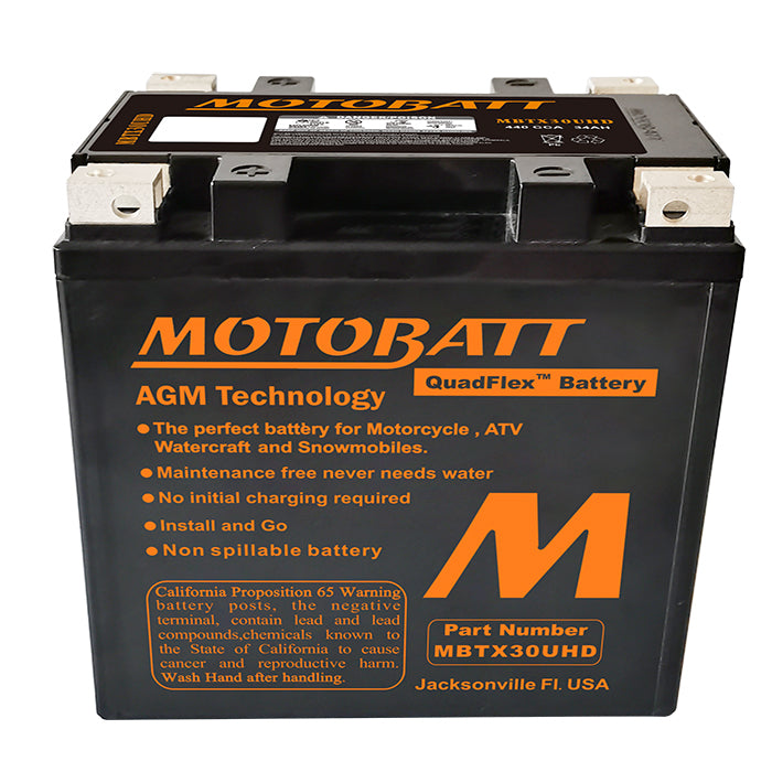 UTV Stereo MOTOBATT HD AGM battery with black top and terminal posts, front view showing label and battery casing.